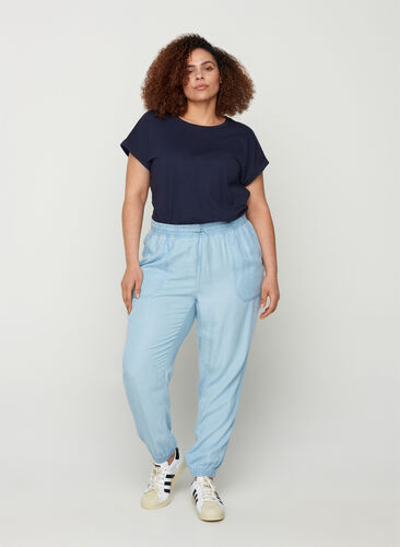 Løse bukser i med lommer, Light blue denim, Model image number 0