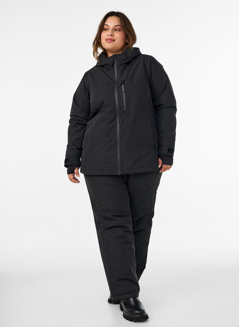Skijakke med h&aelig;tte og lynl&aring;slommer, Sort, Model image number 1