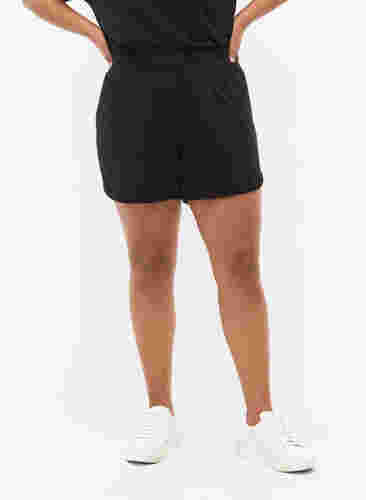 Ensfarvede sweatshorts med lommer, Black, Model image number 2
