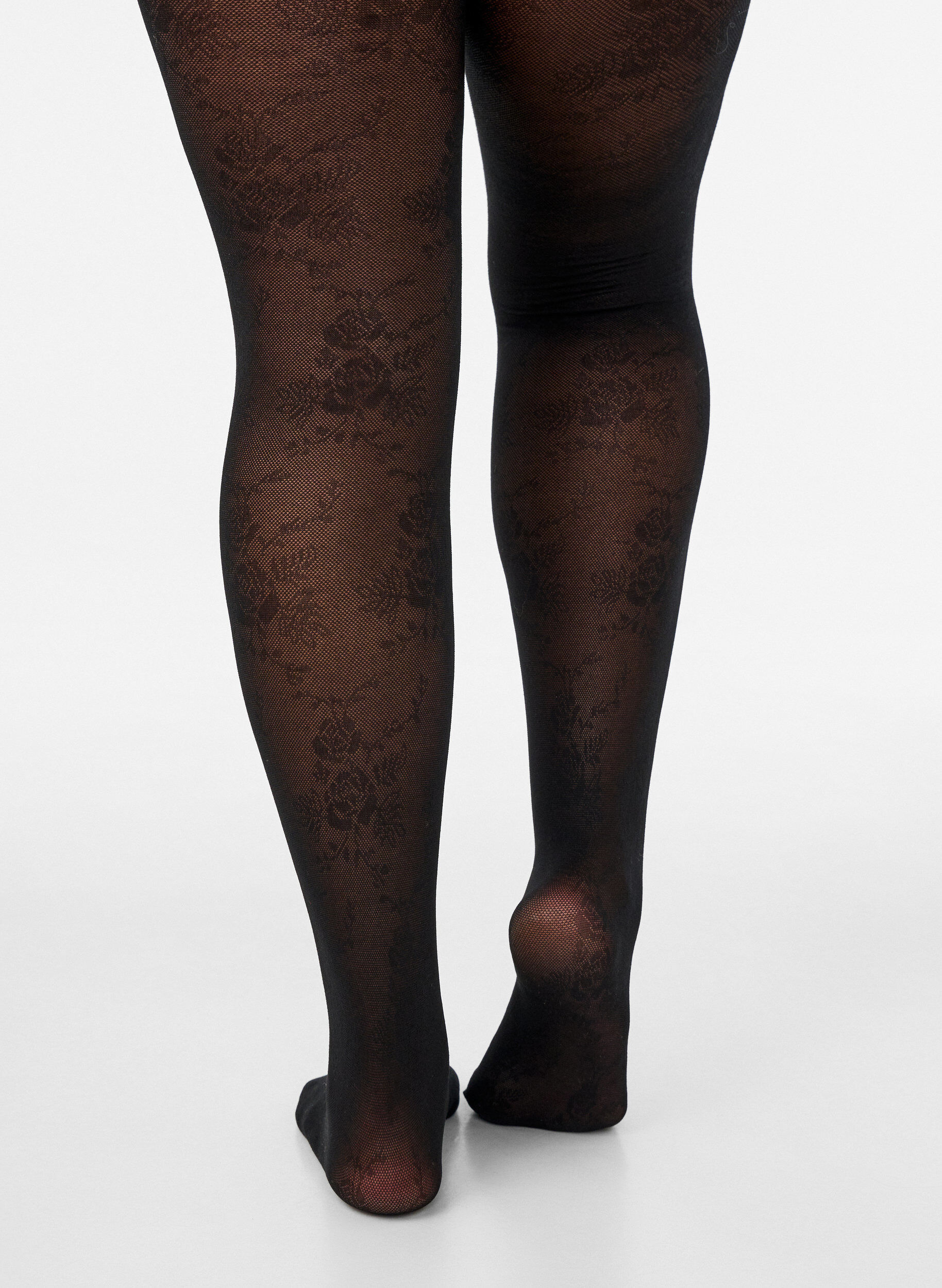ZizziStr&oslash;mpebukser 50 denier med blomsterm&oslash;nster, Sort, Model image number 3