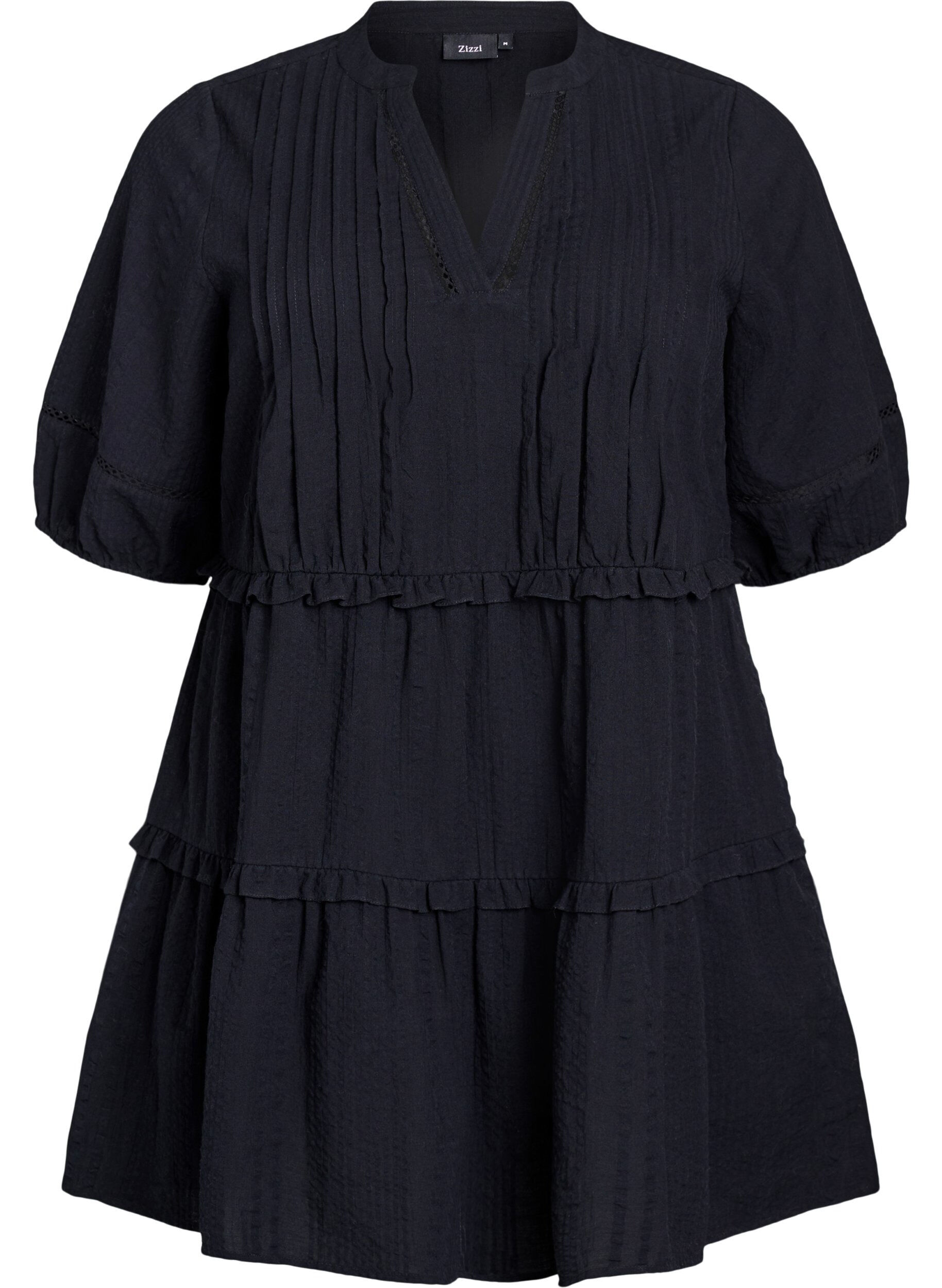 Tunika med fl&aelig;ser og A-facon