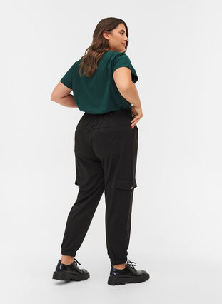 Løse bukser med elastikkant og lommer, Black, Model image number 1