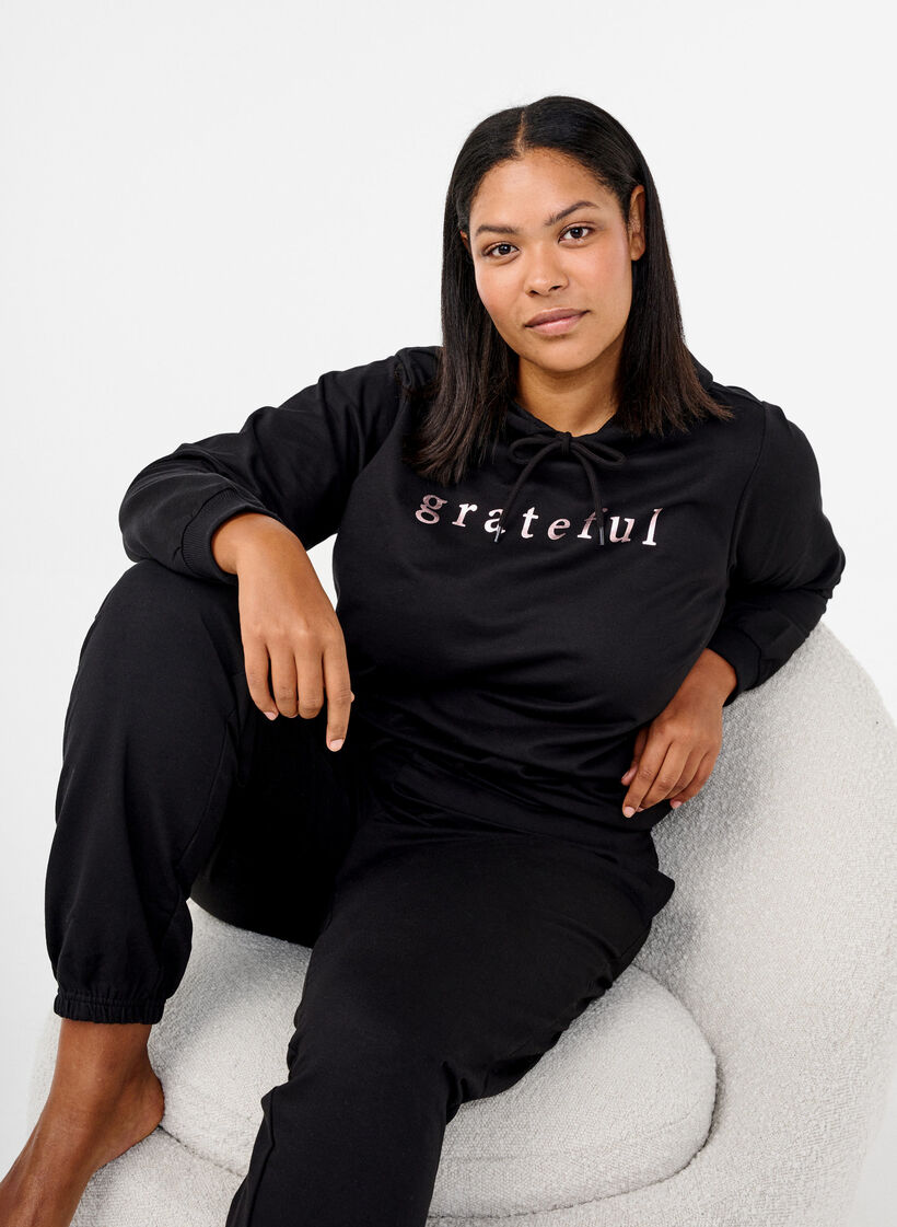 Sweatshirt med h&aelig;tte og print, Sort, Image image number 0