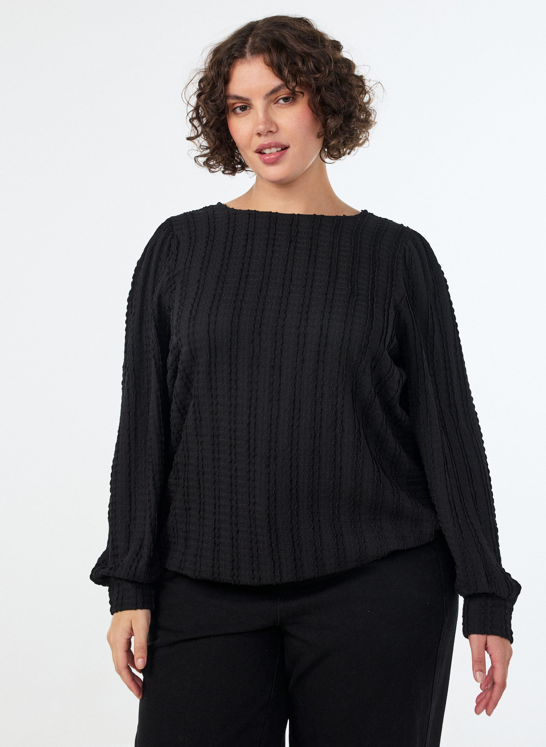 Jerseybluse med struktur og ballonform, Sort, Model