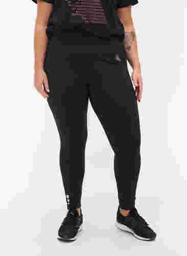 Cropped træningstights med lomme og reflex, Black, Model image number 2