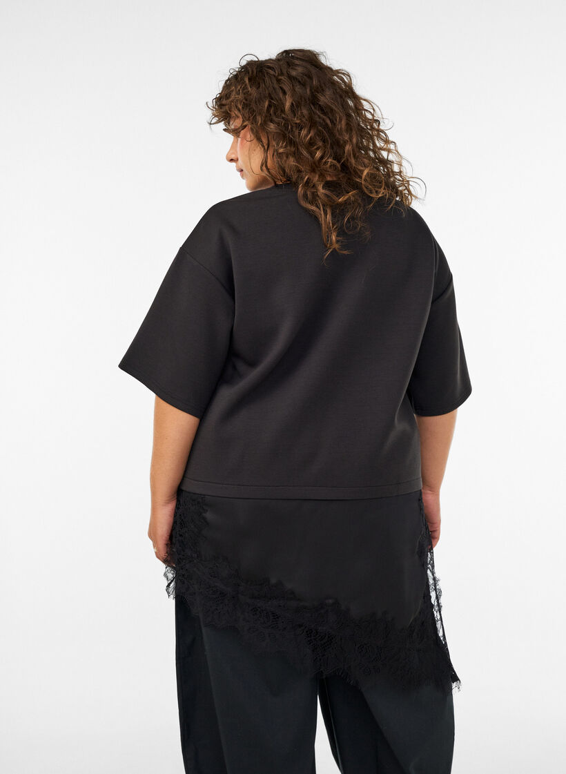 Jerseybluse med lag-p&aring;-lag-look og blonde, Sort, Model image number 2