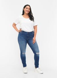 Super slim Sanna jeans med slid, Blue denim, Model