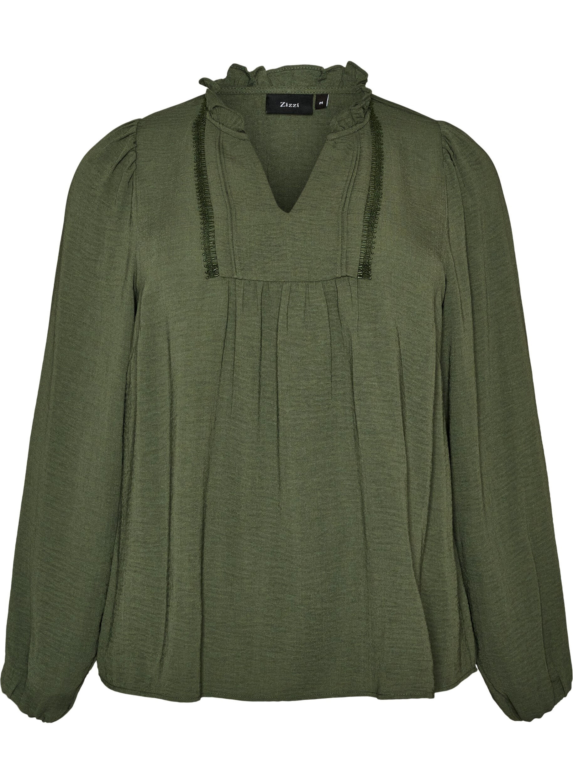 Bluse med V-udsk&aelig;ring og crochetb&aring;nd