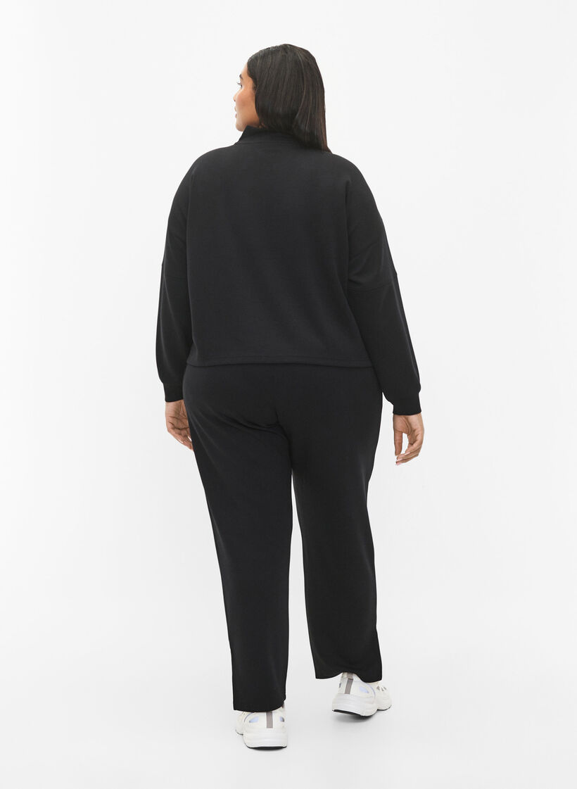 Bukser i modalmix med slids, Black, Model image number 1