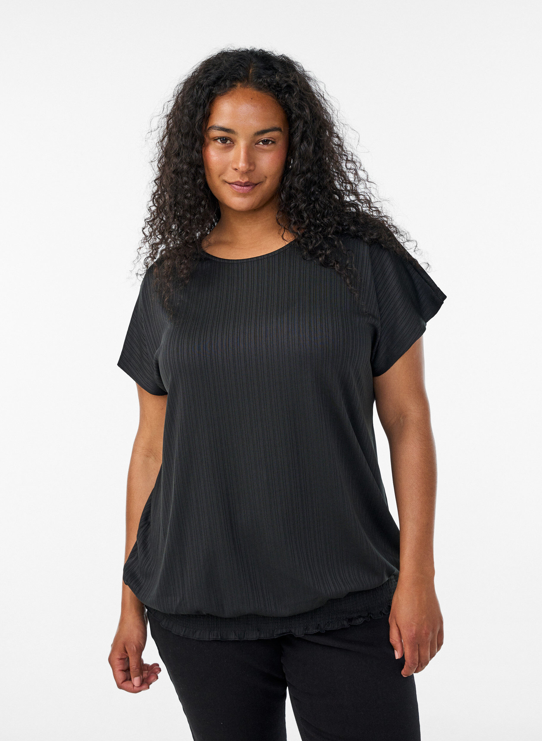 Jerseybluse med strukturstriber og smockkant, Sort, Model