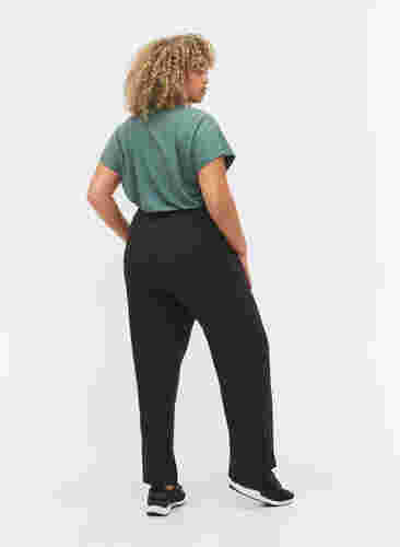 Viskose træningsbukser med lommer, Black, Model image number 1