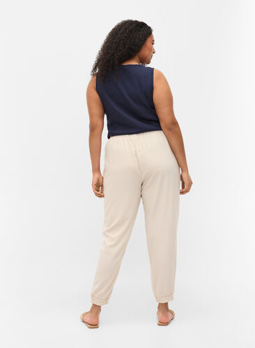 Bukser med lommer og elastikkant , Warm Sand, Model image number 1