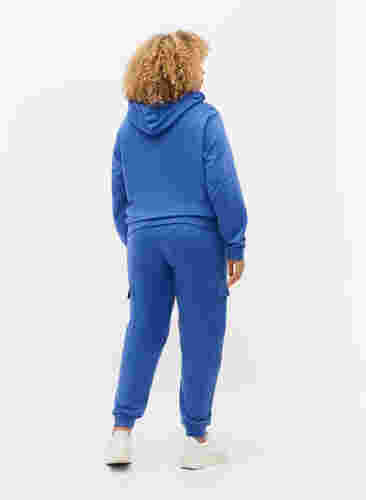 Sweatpants med cargolommer, Dazzling Blue, Model image number 1