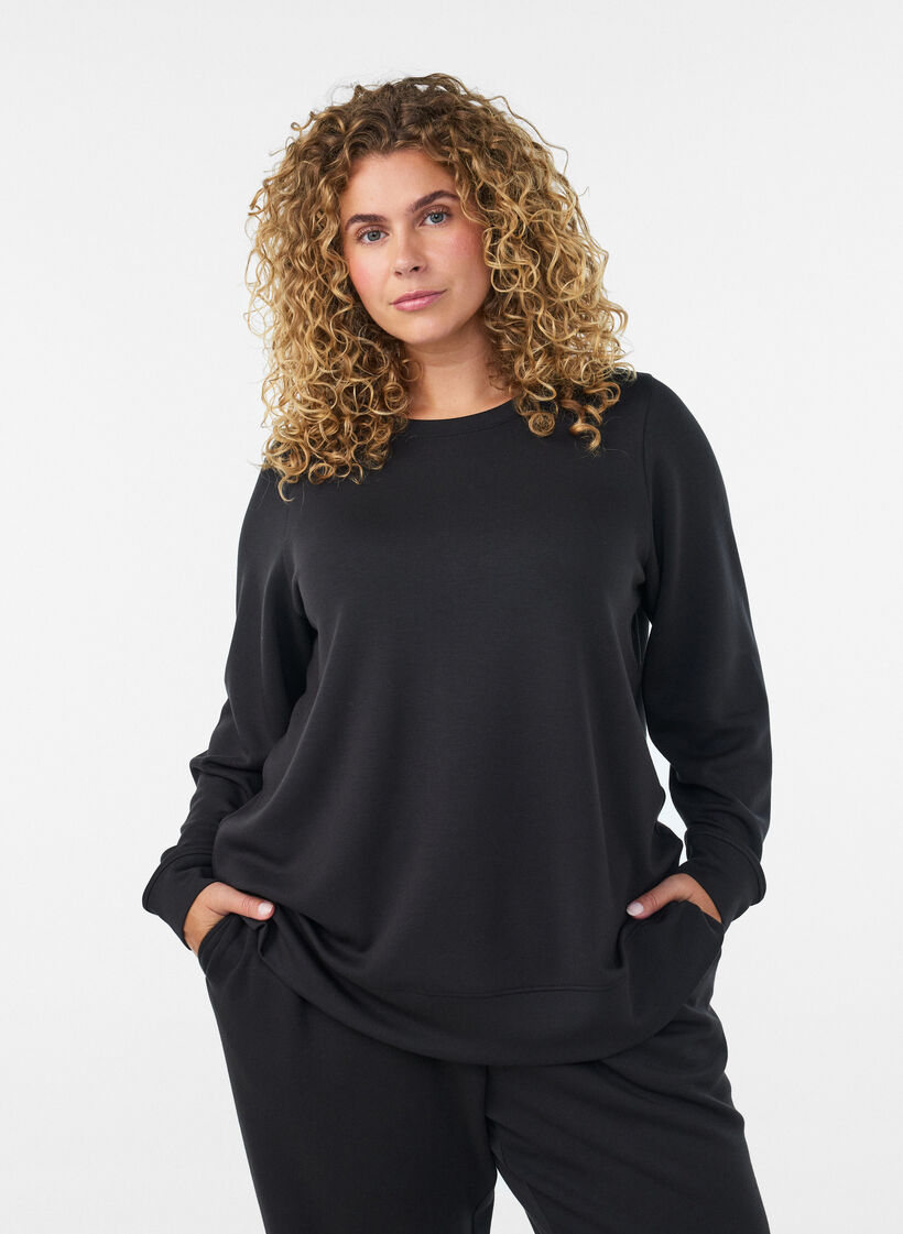 Lang&aelig;rmet jerseybluse med rund hals, Sort, Model image number 0
