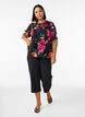 Bluse med blomsterprint og peplum-effekt, Sort, Model image number 1