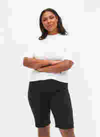 Tætsiddende shorts med baglommer, Black, Model