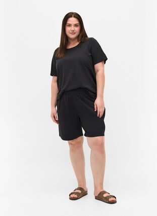 Løse shorts med lommer, Black, Model image number 0