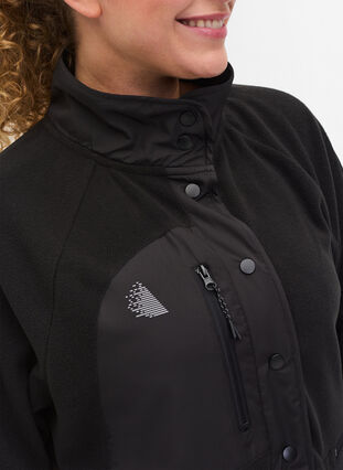 Sportsjakke i fleece med høj krave og lommer, Black, Model image number 2