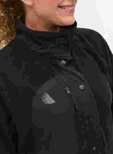 Sportsjakke i fleece med høj krave og lommer, Black, Model image number 2