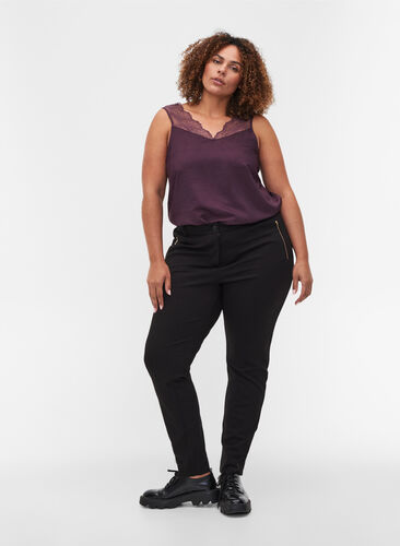 Tætsiddende bukser med lommer og lynlås, Black, Model image number 0