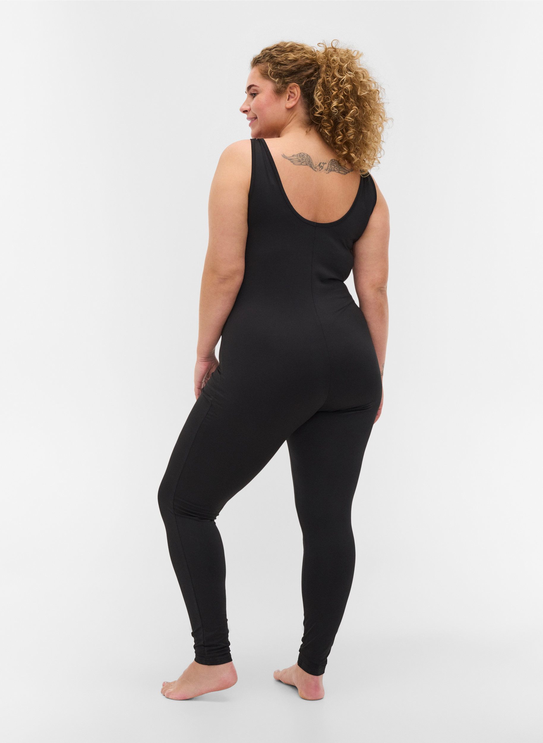 Tætsiddende trænings jumpsuit, Black, Model image number 1